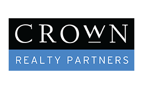BOMA BEST - The Crown Realty Partners logo showcases a sleek black background with "Crown" elegantly scripted in white above a blue rectangle, subtly echoing the BOMA standards, where "Realty Partners" is crisply displayed in white text.